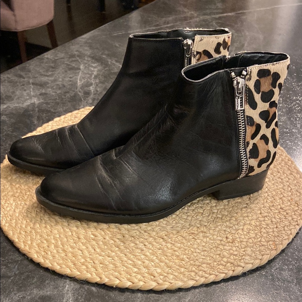 Calvin Klein Black and Cream Ankle Booties with Sleek Silhouette